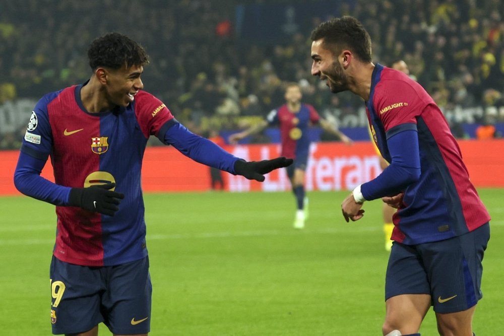 ferran torres of barcelona r celebrates with teammate lamine yamal l after scoring the 2 3 goal in action during the uefa champions league match between borussia dortmund and fc barcelona efe